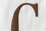 Example of a clean, contemporary sans-serif font for the initial 'C' in embroidery.
