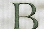 Example of a classic, refined serif font for the initial 'B' in embroidery.